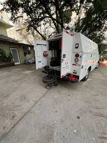 Magnet Plumbing service vehicle on-site for Grease Trap Cleaning in Bel-air Heights